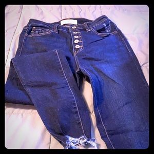 High waisted dark blue button up jeans